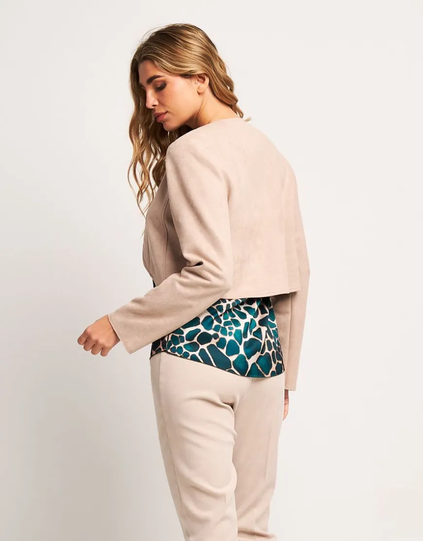 Bolero in ecosuede con bordi stondati