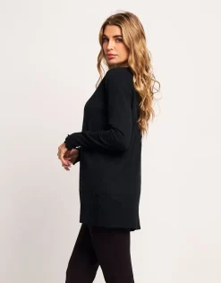 Cardigan in maglia lurex con volant e bottoni