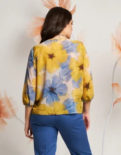 Casacca in fantasia gialla con fiocco