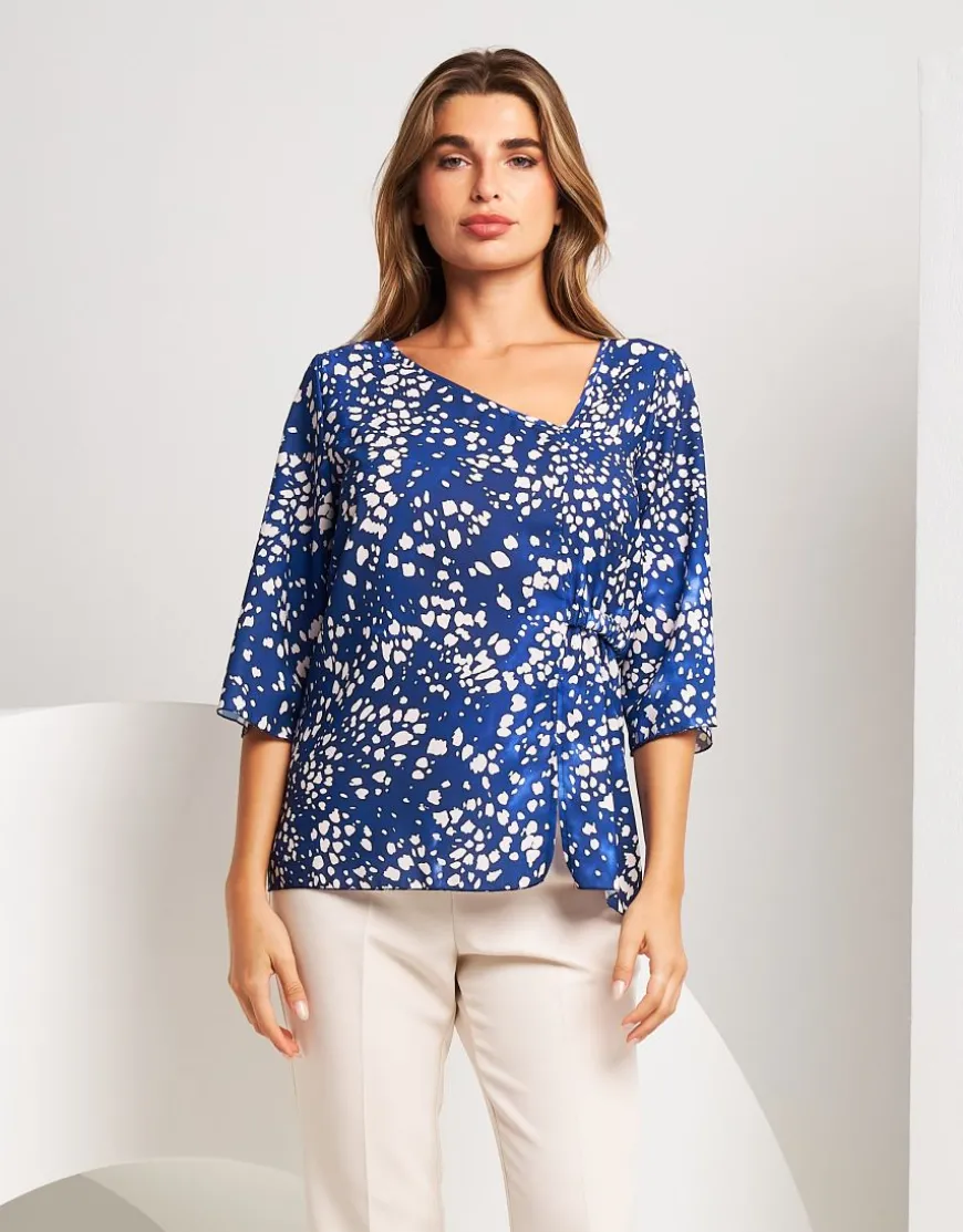 Casacchina fantasia con scollo asimmetrico