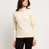 Dolcevita a coste con maniche raglan