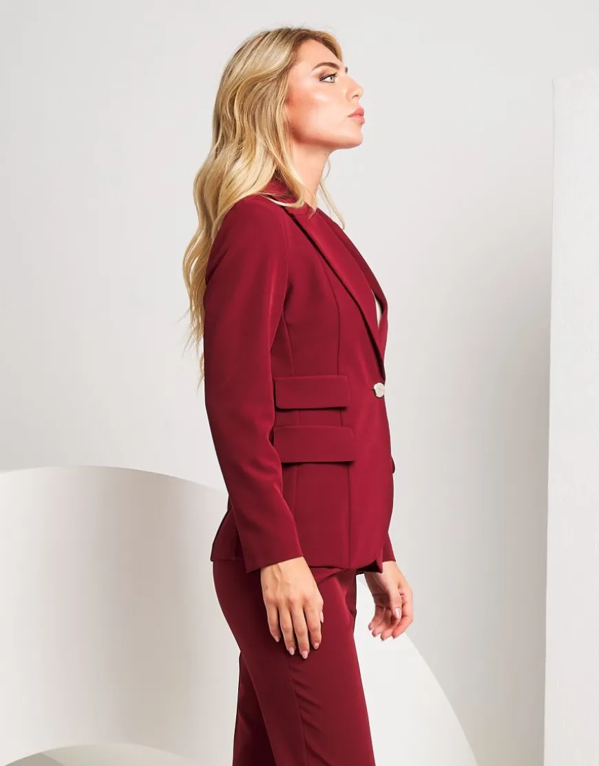 Giacca con revers e pattine laterali