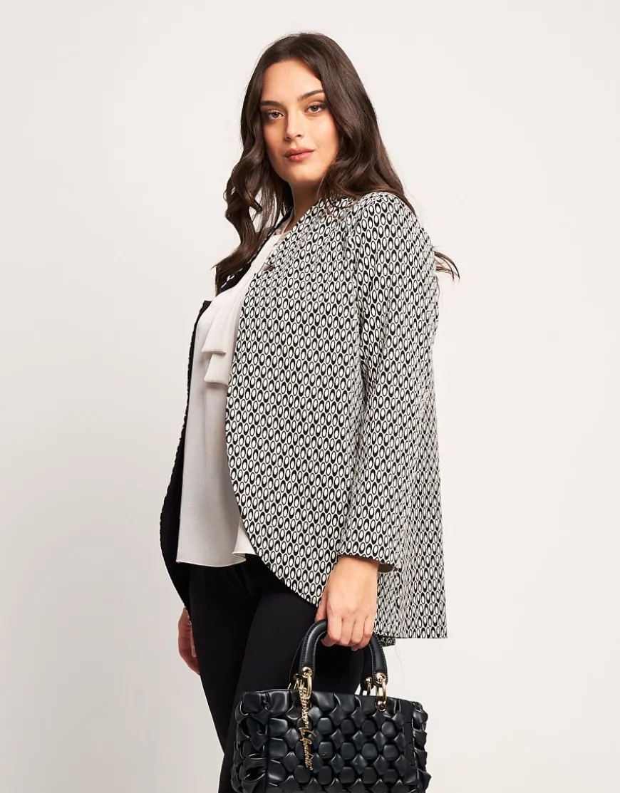 Giacca jacquard a pois con collo revers
