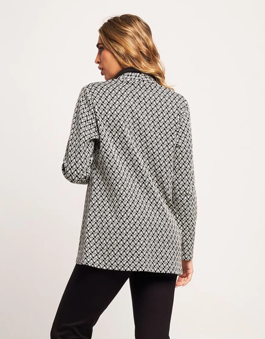 Giacca jacquard a pois con collo revers
