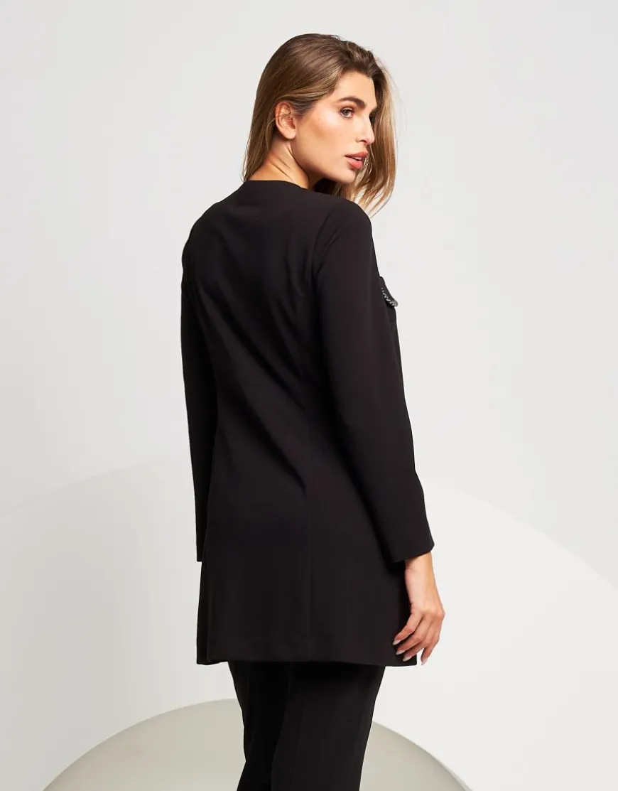 Giacca lunga con pattine bordate fantasia