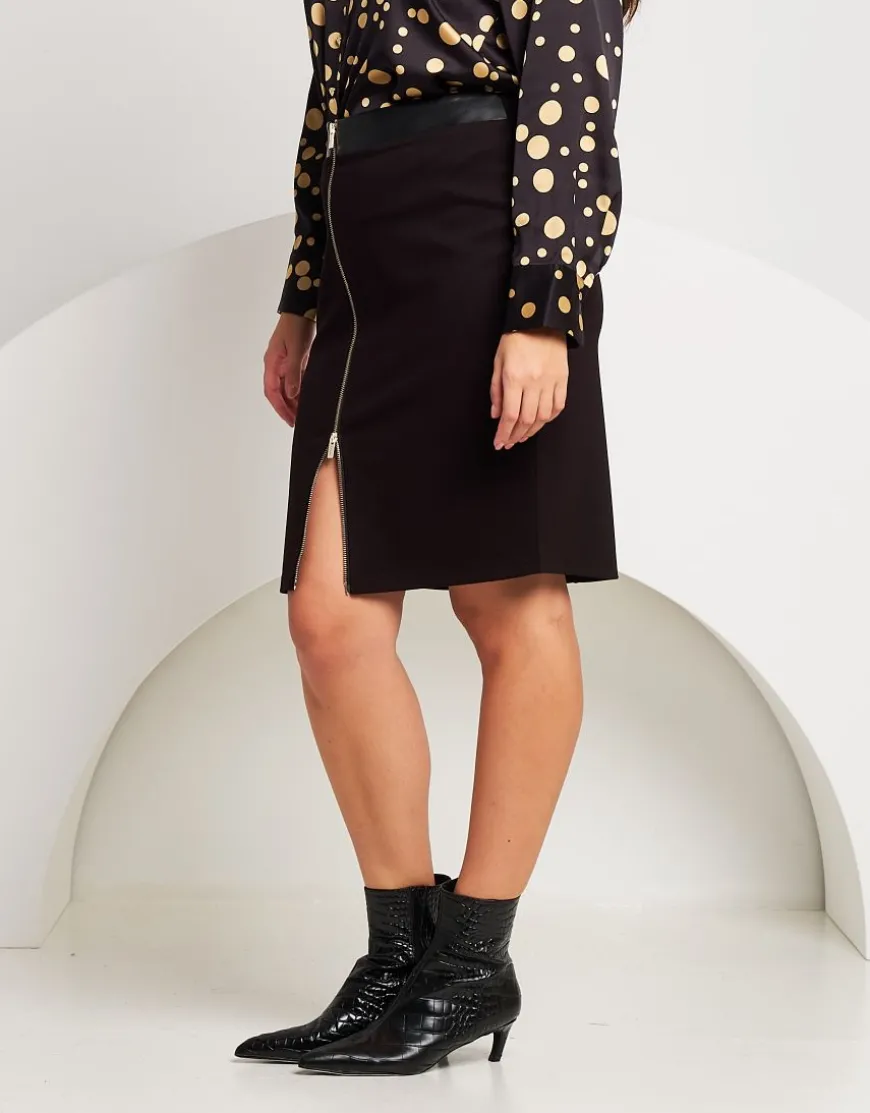 Gonna tubino con zip e fascia in ecopelle