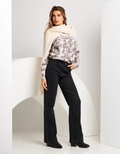Jeans largo con tasca animalier