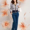 Jeans largo con tasche