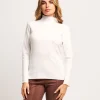 Maglia a coste con collo alto e strass