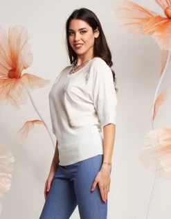 Maglia a pipistrello con applicazioni
