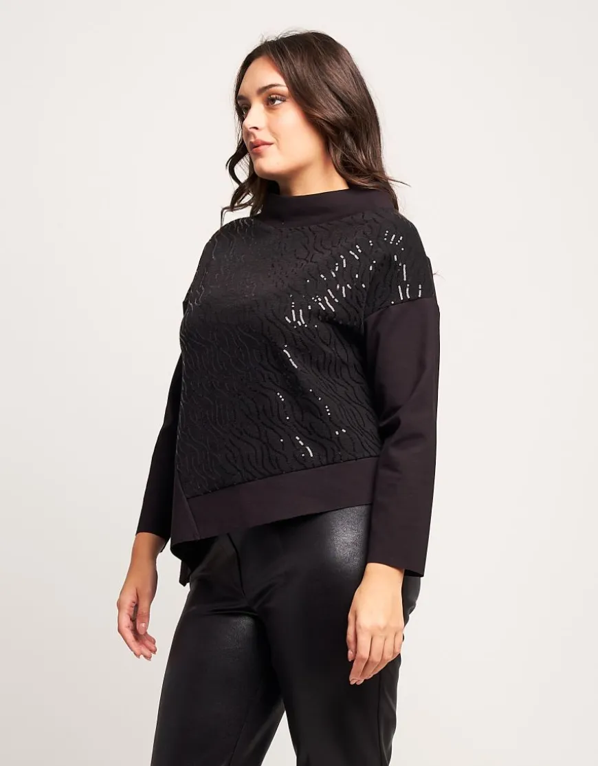 Maglia asimmetrica con ricamo in paillettes