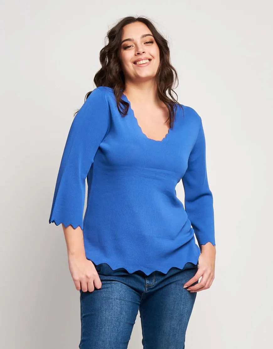 Maglia con bordi ondulati