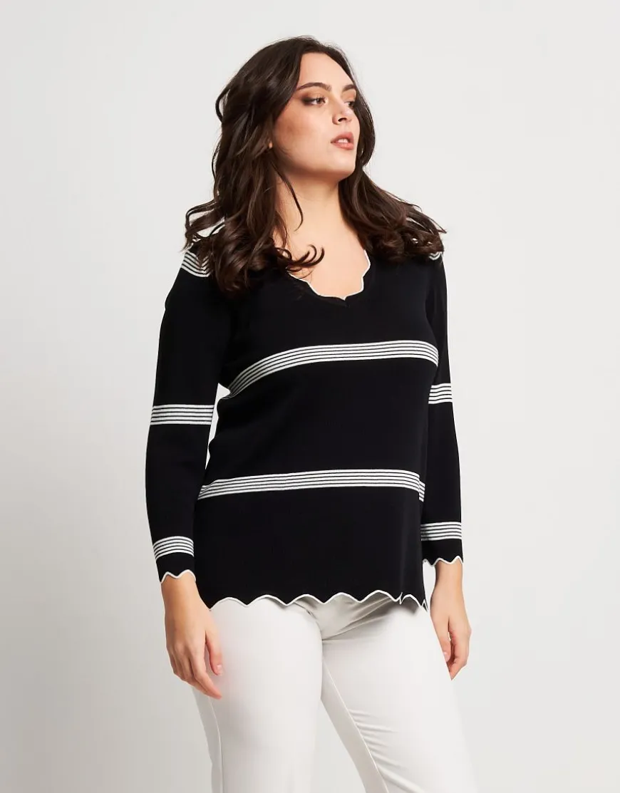 Maglia in maglia battuta con cappe