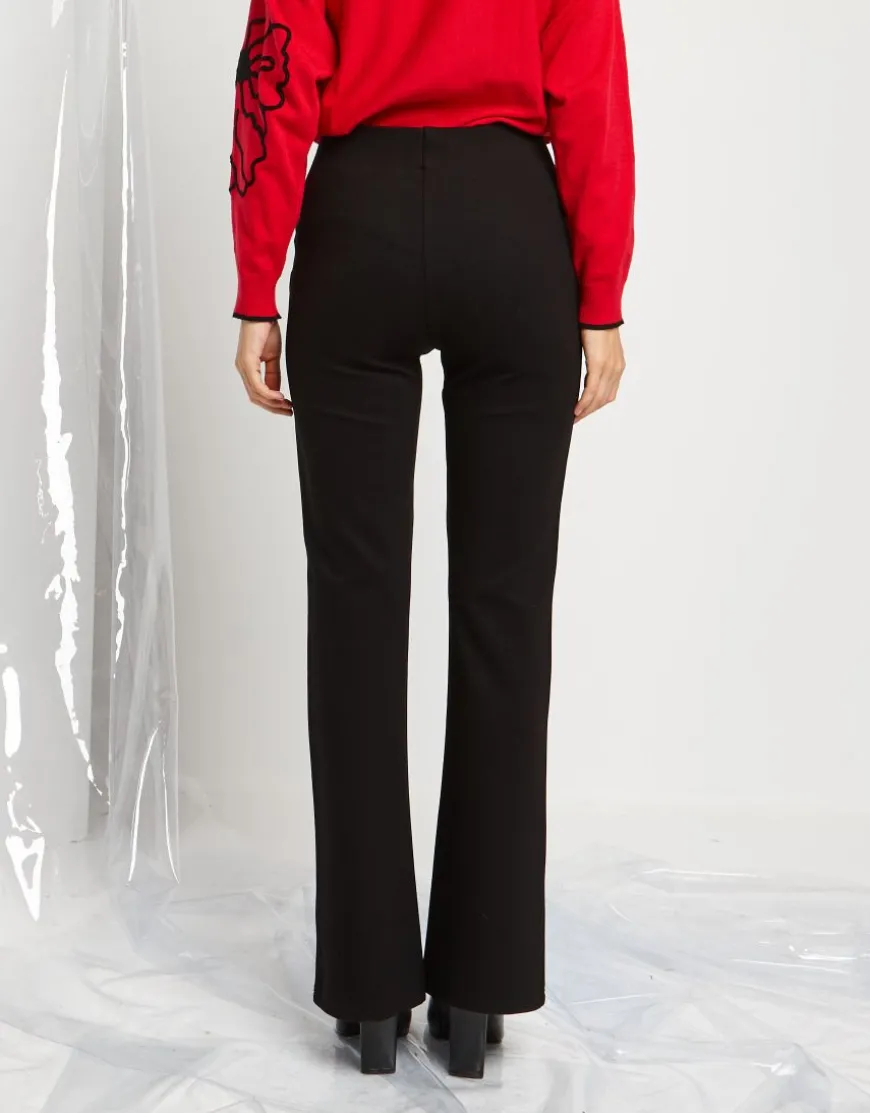 Pantalone con ecopelle e bottoni