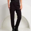 Pantalone con elastico e riporti in paillettes