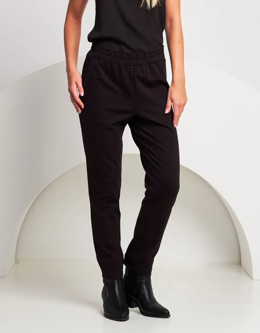 Pantalone con elastico e riporti in paillettes