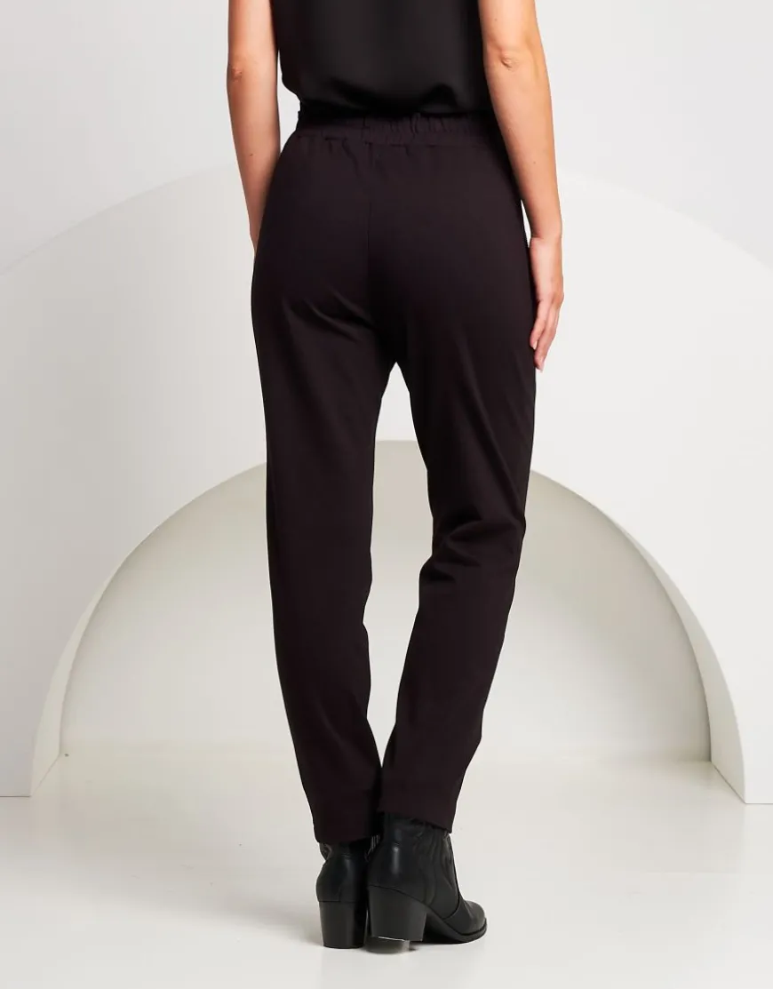 Pantalone con elastico e riporti in paillettes