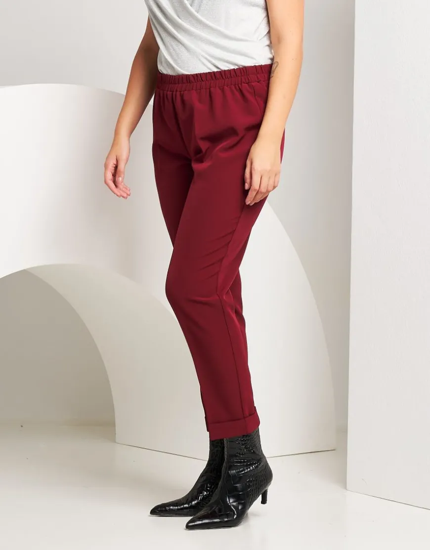 Pantalone con elastico in vita e risvolto
