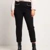 Pantalone con risvolto e pattine bordate