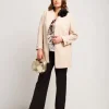 Pantalone con zip e spacchi