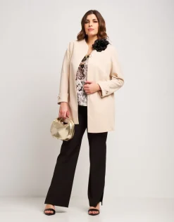 Pantalone con zip e spacchi