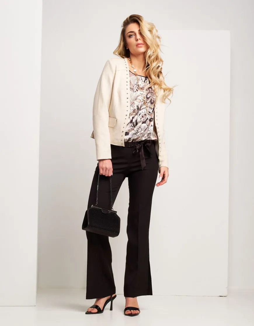 Pantalone con zip e spacchi