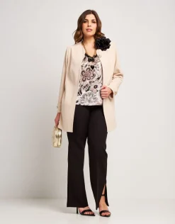Pantalone con zip e spacchi