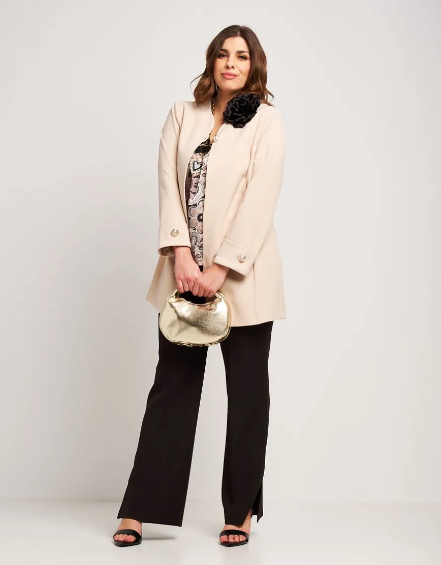 Pantalone con zip e spacchi