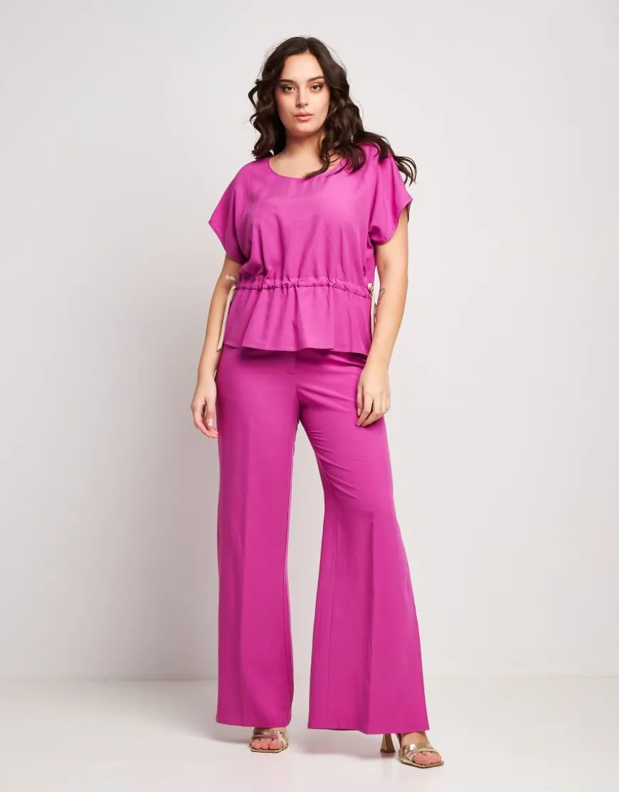 Pantalone in viscosa con spacchi sul fondo