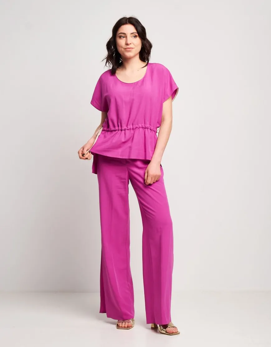 Pantalone in viscosa con spacchi sul fondo