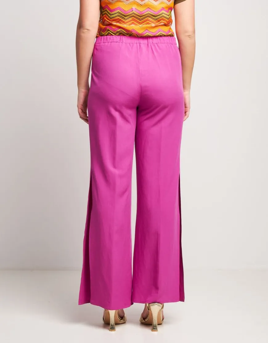 Pantalone in viscosa con spacchi sul fondo
