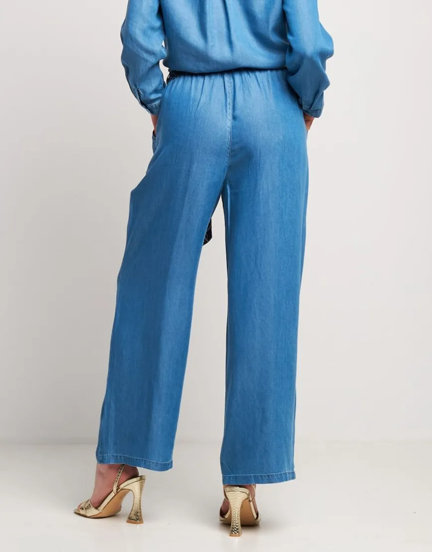 Pantalone largo in denim con tasche