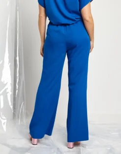 Pantalone largo in tessuto fluido con elastico e zip