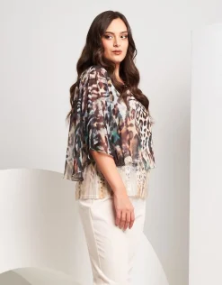 Poncho animalier con paillettes