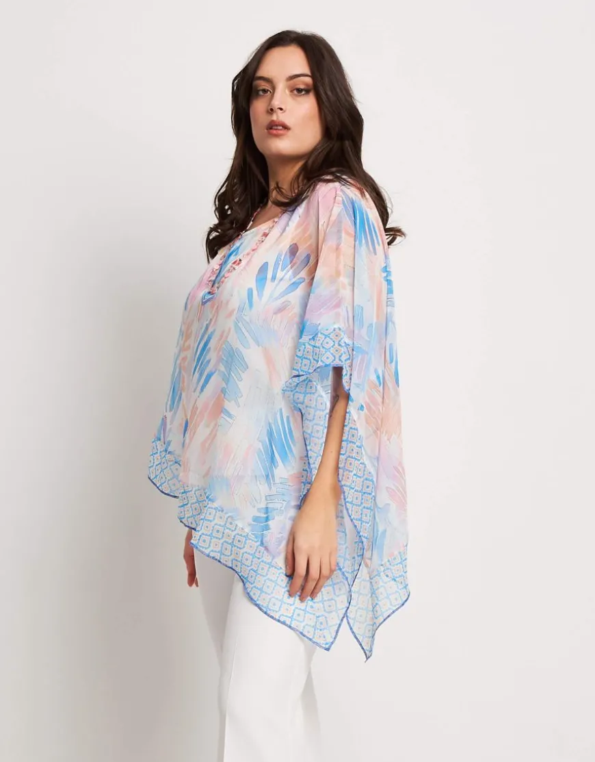 Poncho asimmetrico con top e paillettes