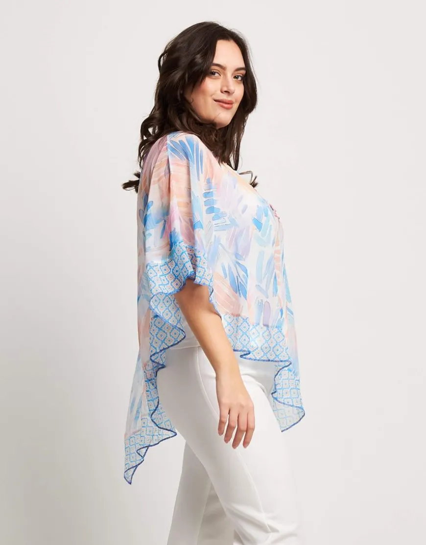 Poncho asimmetrico con top e paillettes