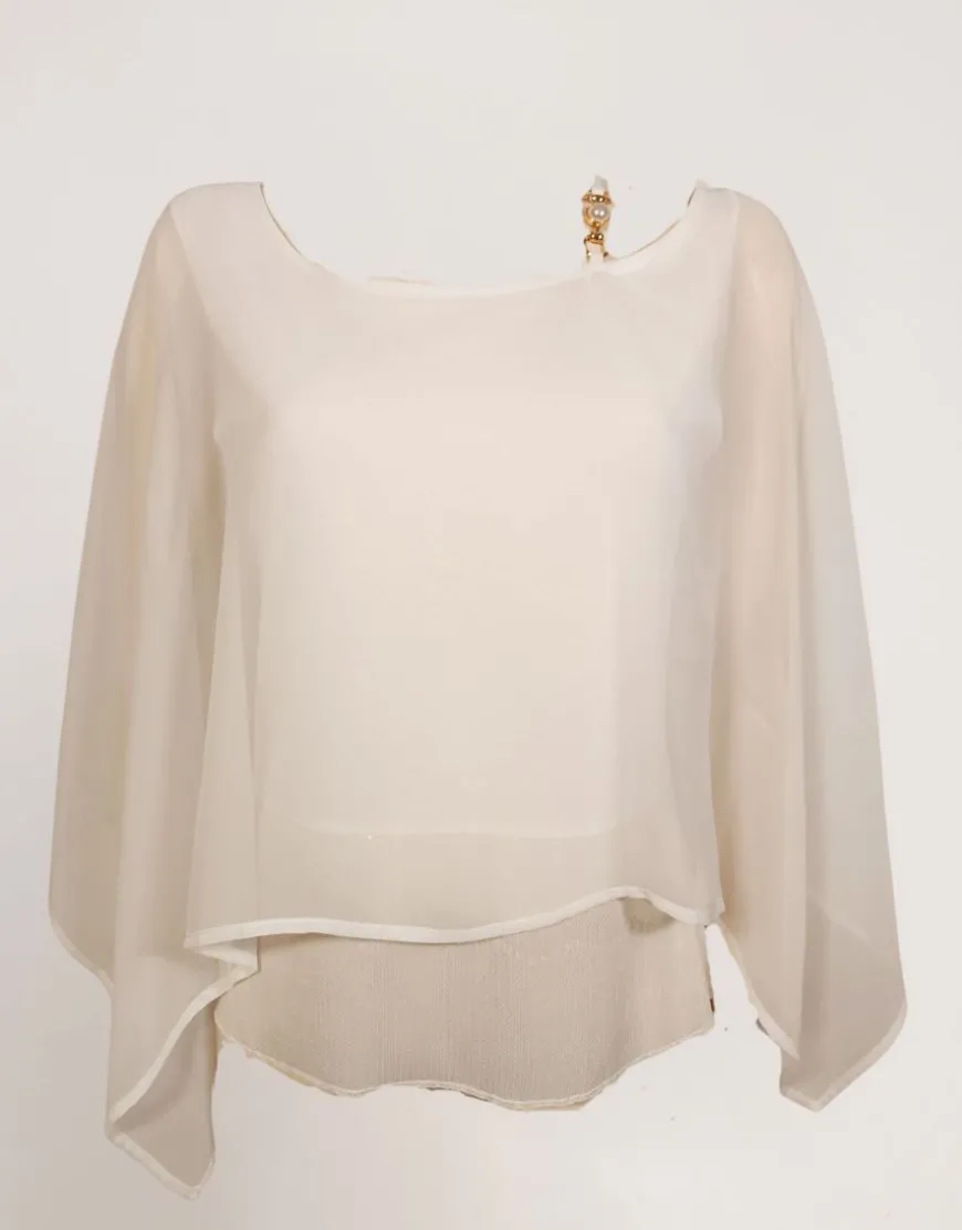 Poncho con accessorio e paillettes