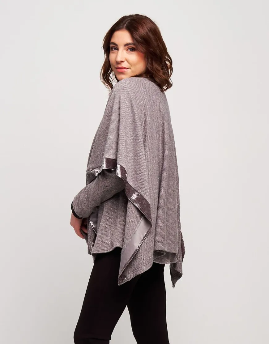 Poncho con bordure in velluto
