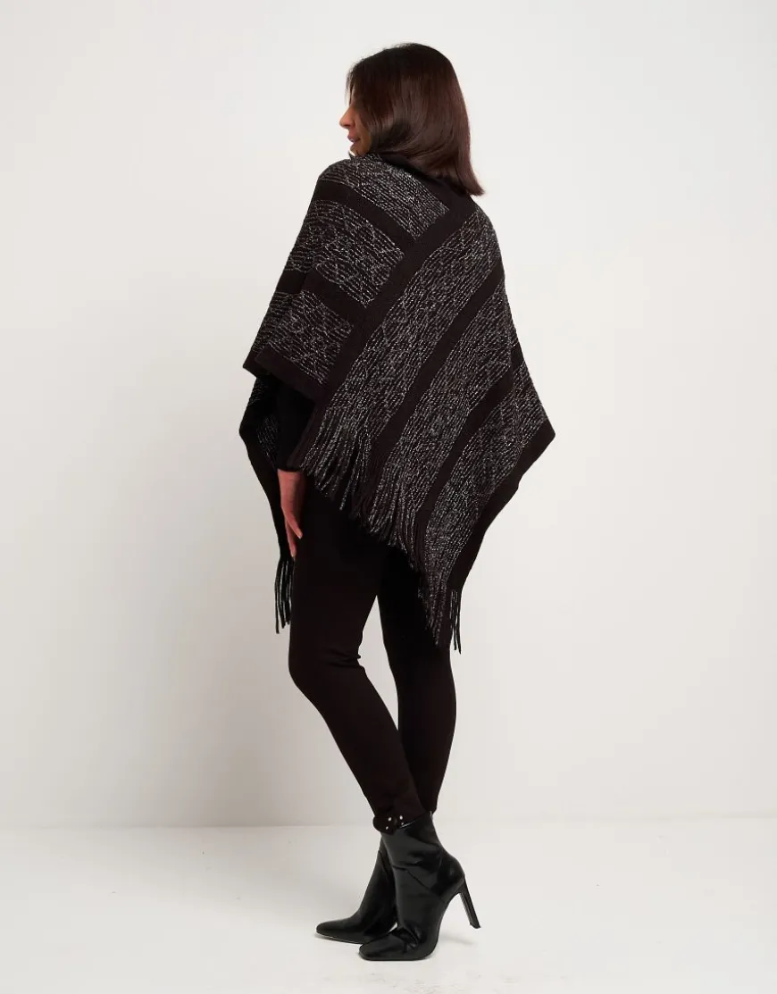 Poncho con disegno e frange