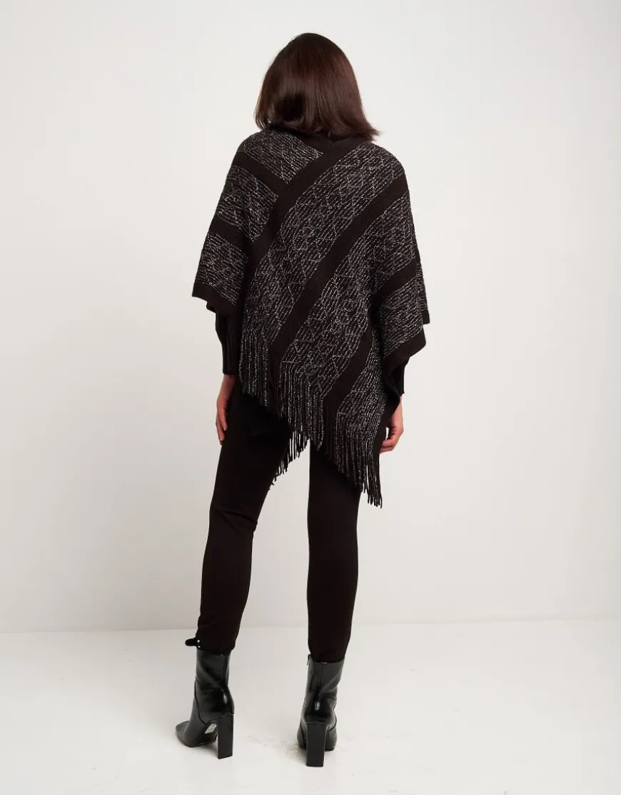 Poncho con disegno e frange