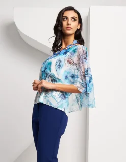 Poncho fantasia cielo con paillettes