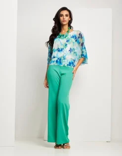 Poncho fantasia menta con paillettes