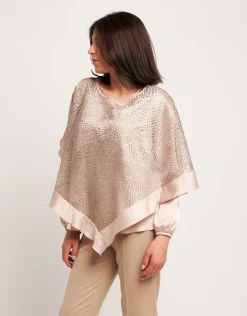 Poncho in pizzo con raso