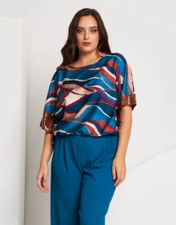 Poncho in raso con elastico e paillettes