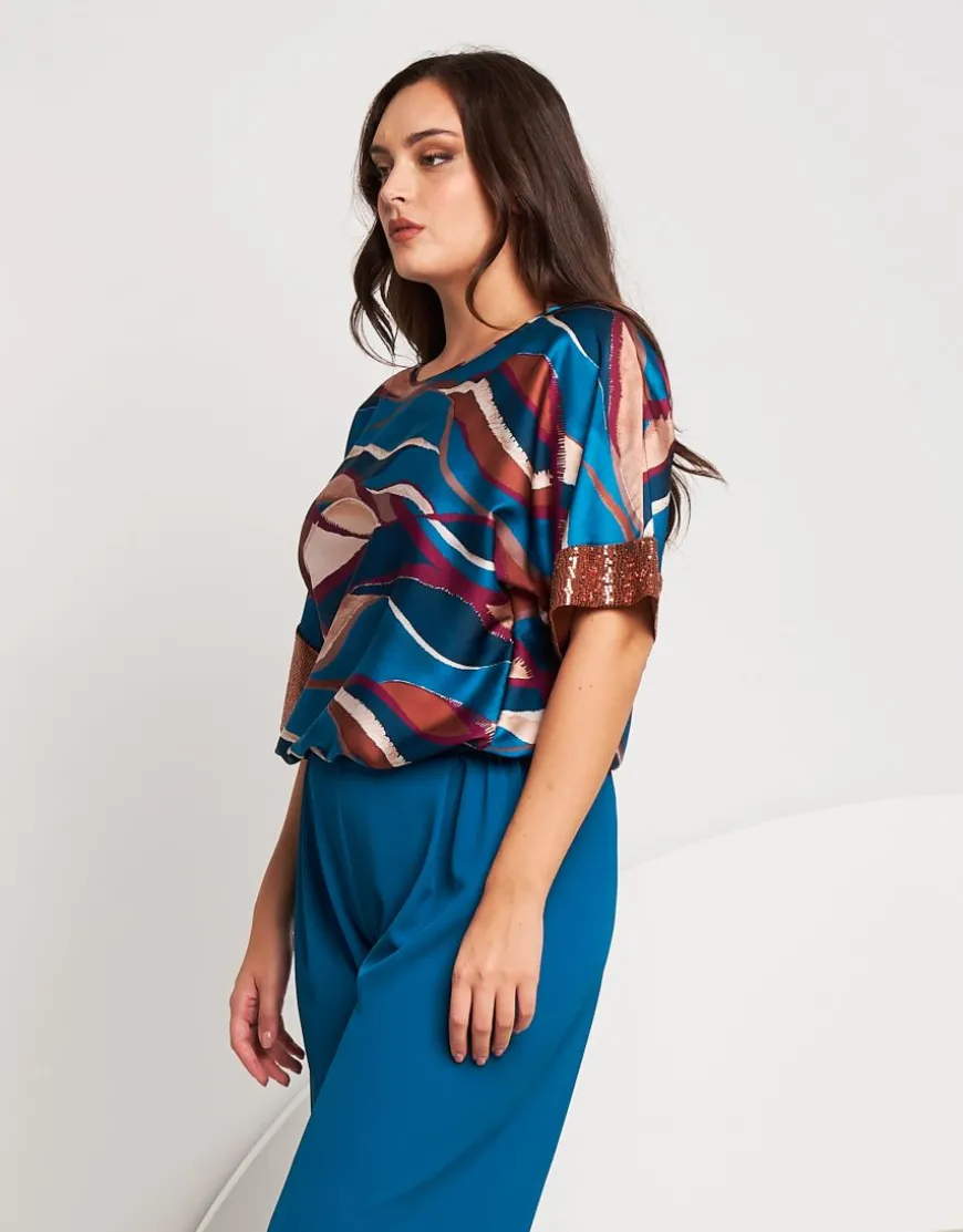 Poncho in raso con elastico e paillettes