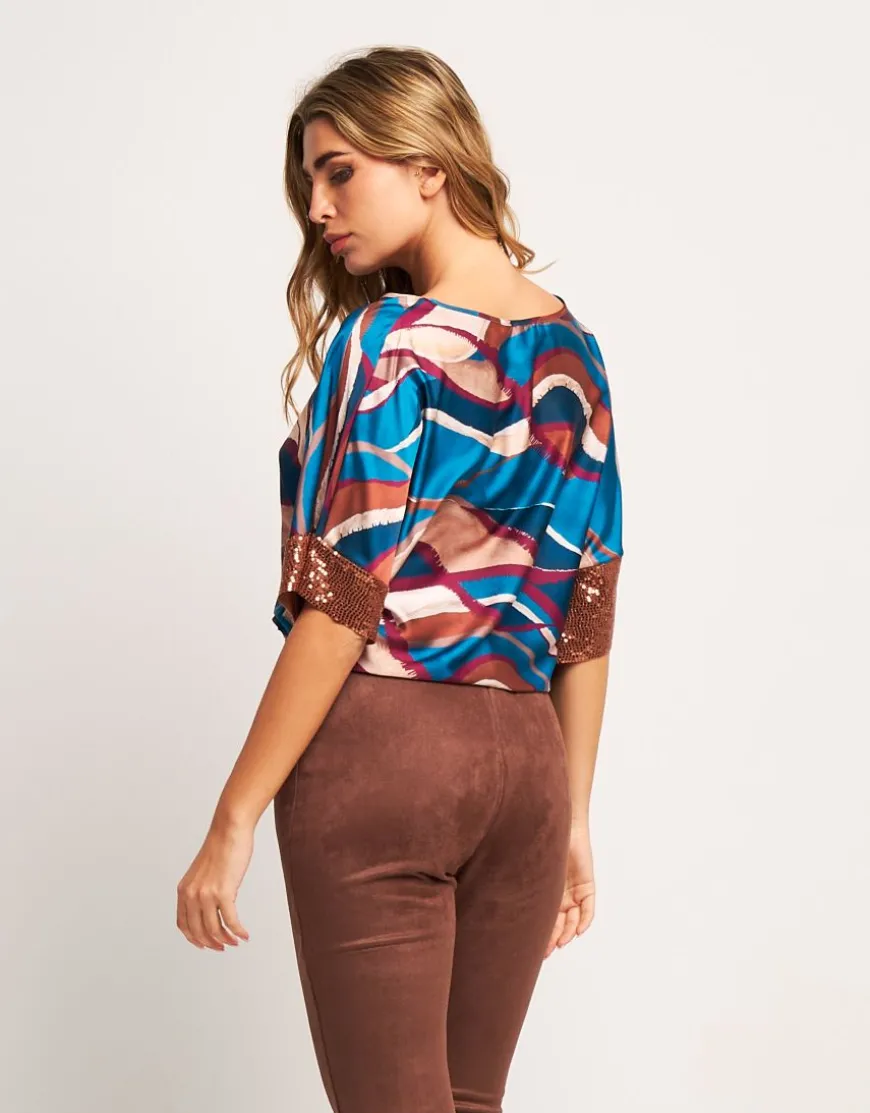 Poncho in raso con elastico e paillettes