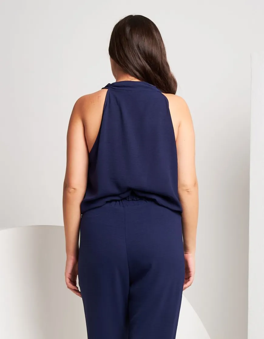 Top con sciarpina e paillettes