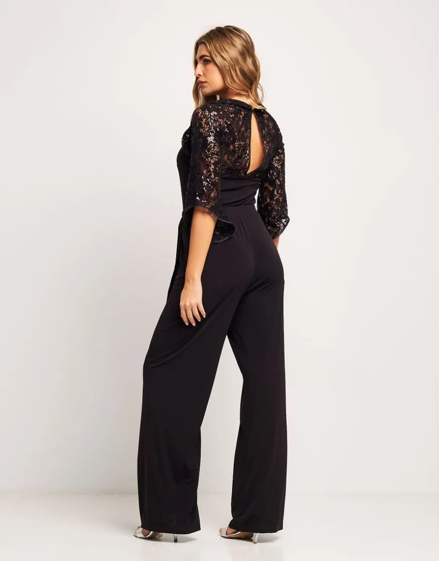 Tuta con pizzo e paillettes