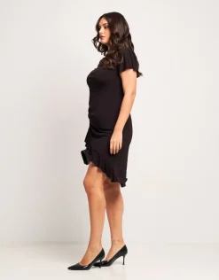 Vestito con manica in pizzo e paillettes