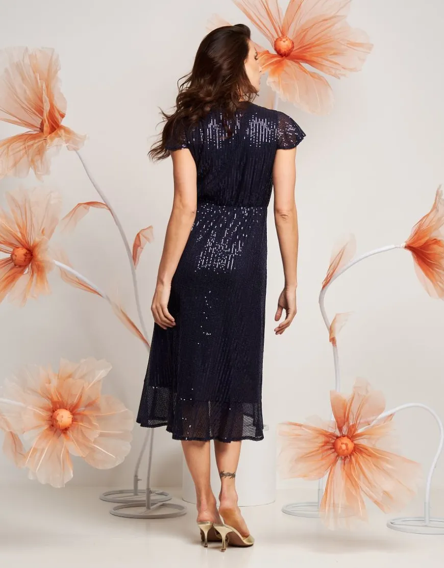 Vestito in paillettes con volant